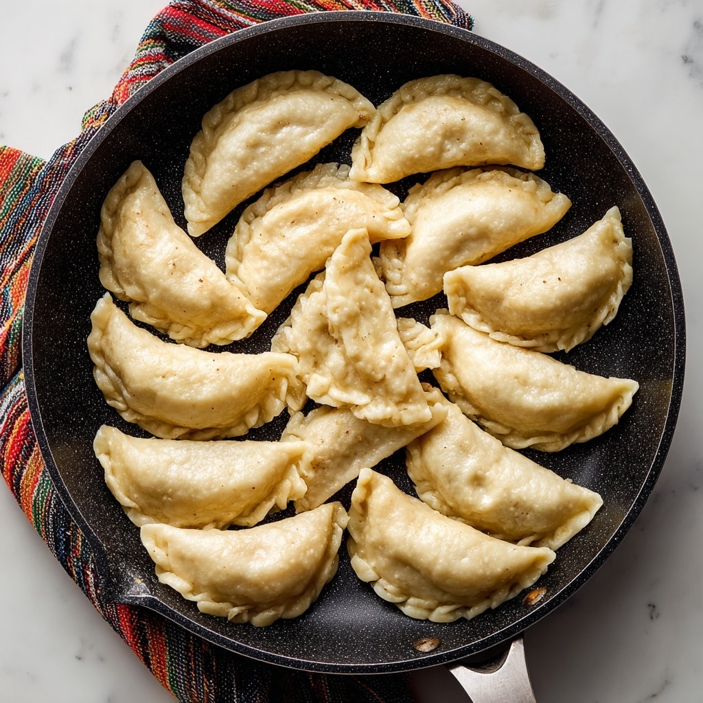 Homemade Pierogi with Cheddar and Onion Filling Recipe